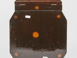an old wooden box sitting on top of a white surface
