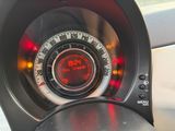 a close up of a speedometer in a car ' s dashboard