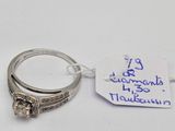 an image of a ring with a tag attached to it