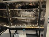 a large oven that has a lot of food inside of it