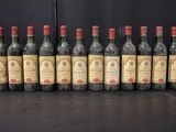 a group of bottles of wine sitting on top of a table