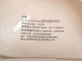 a close up of a toilet seat with a label on it