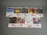 a lot of nintendo wii games on the table