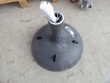 a umbrella that is sitting on top of a metal pole