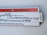 a close up of a load adjuster on a white surface