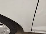 a close up of a white car with the door open