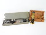a small box with a pair of glasses and a pair of scissors
