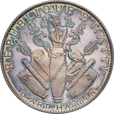 an image of a silver coin with a picture of a woman on it