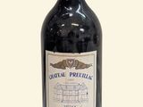 a bottle of wine that is sitting on a table
