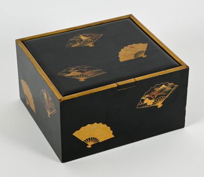 an image of a black box with gold designs on it