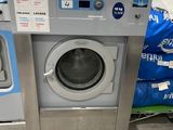 a washer and a dryer in a laundry room