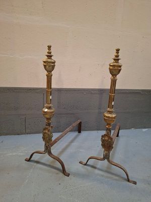 pair of antique brass candlesticks in the shape of candlesticks