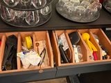 a table with a lot of glasses and other items on it