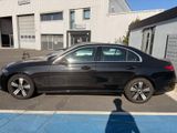 mercedes s - class parked in front of a building in a parking lot