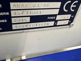 a close up of a sign on the side of a blue bench