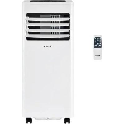 a white air conditioner sitting next to a remote control