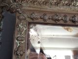 a person taking a picture of themselves in a mirror