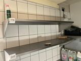 a shelf that has a lot of cleaning products on it