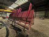an image of a large red machine in a warehouse