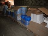 a large amount of boxes and boxes of water on a pallet