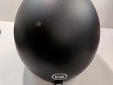 an image of a black helmet on a white table