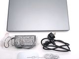 a laptop and a mouse sitting on a table