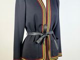 an image of a woman ' s jacket on a mannequin