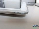 a close up of a cell phone sitting on a table