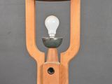 an image of a wooden lamp with a light bulb on it