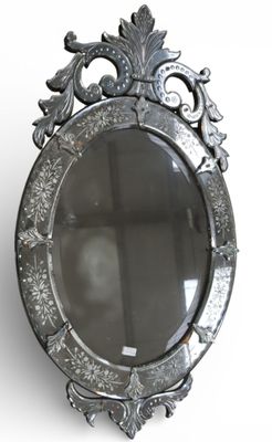 a mirror that is hanging on the wall in the room