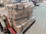 a large stack of boxes sitting on a pallet in a warehouse