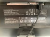 a close up of a printer with a cable attached to it