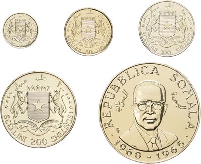 four different types of coins are shown on a white background