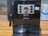 a coffee machine that is sitting on a wooden table