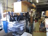 a room filled with lots of items in a warehouse