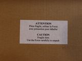 a box with a sign on it that says attention
