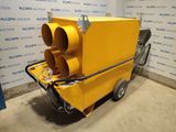 a close up of a yellow street light on a cart in a room