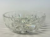clear glass bowl on a white table with a white background