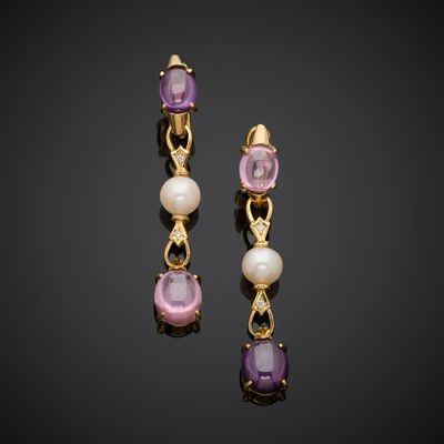 a pair of amethorate and pearl earrings