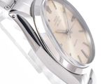a silver watch with a white dial on a silver bracelet
