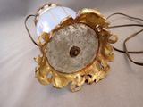 a lamp that is sitting on a table with a cord