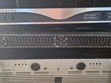 many different types of electronic equipment stacked on top of each other