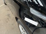 a car that has a sticker on the side of it
