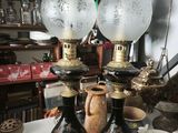 two lamps that are sitting on top of a table