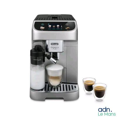 an image of a coffee machine with a cup of coffee next to it
