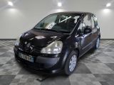 a picture of a small black car parked in a garage