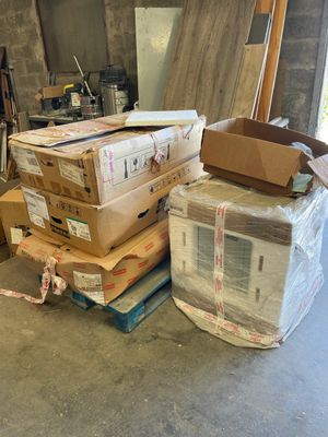a pile of boxes that are stacked on top of each other