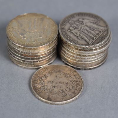 a lot of coins sitting on top of each other