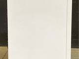 an image of a white refrigerator with a blue sticker on the door