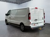 a white van that is parked in a room